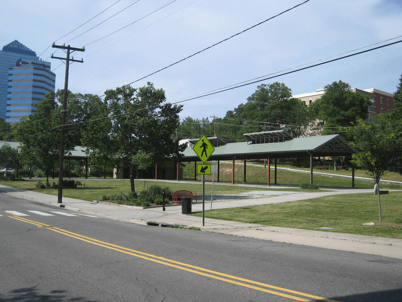 a bus stop on the side of the road