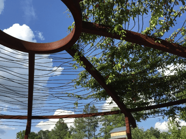 a metal structure with a circular hole in the middle of it