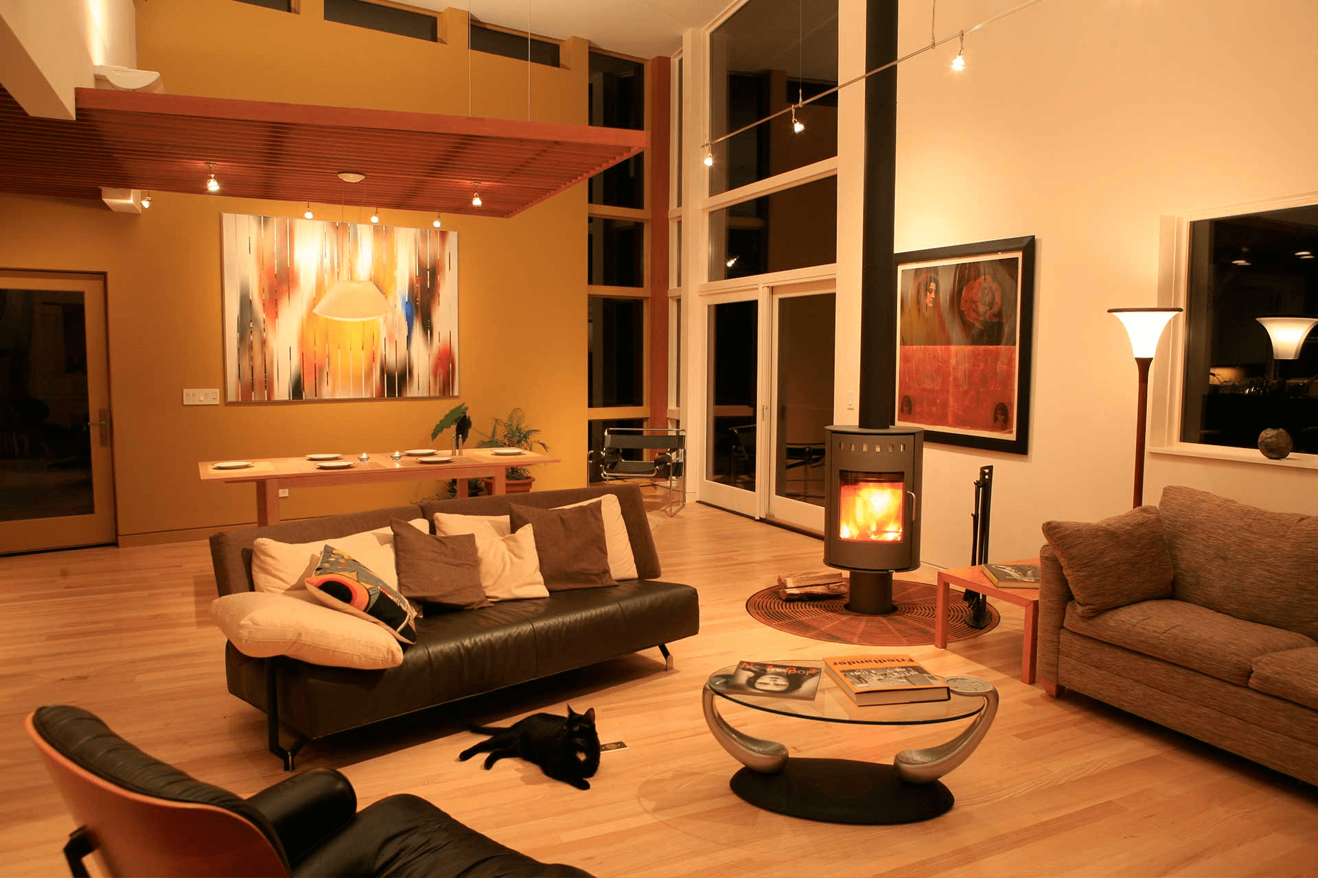 a living room filled with furniture and a fire place