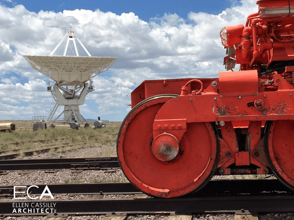 a red train engine sitting on top of train tracks